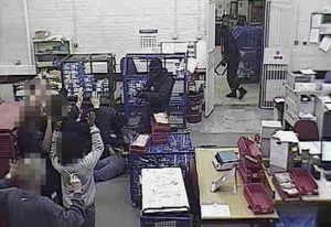 Undated Kent Police handout photo of CCTV footage of the Britain's biggest cash robbery taking place at the Securitas depot in Tonbridge, Kent, in February 2006. Picture shows some of the men involved in the raid gaining access to the depot and holding staff at gunpoint. PRESS ASSOCIATION Photo. Issue date: Monday January 28, 2008. Five men were found guilty today of a series of charges in connection with Britain's biggest cash robbery. They were convicted by an Old Bailey jury over the £53 million heist at the Securitas depot in Tonbridge, Kent, in February 2006. The robbery gang kidnapped Securitas manager Colin Dixon, his wife Lynn, and their young child at gunpoint to gain entry to the building. CCTV seen in court showed them trussing up 14 employees with cable ties as they loaded cash into a 7.5-ton Renault lorry during the 66-minute early morning raid. See PA story COURTS Robbery. Photo credit should read: Kent Police/PA Wire